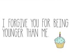 a cupcake with a candle on it that says i forgot you for being younger than me