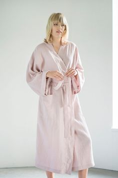 "Every morning, when we get out of bed, we look for a bathrobe, which warms us up and pleasantly embraces us, and in the evenings it wraps around us after a shower or sauna. The \"LinenRain\" bathrobe is made of smooth and soft linen material, which is pleasant to the touch and non-allergenic. In the morning, look for a linen bathrobe and enjoy a cup of coffee or tea and feel how cozy and warm You are. A wide choice of colors will allow You to choose a dream bathrobe. You can buy this natural li Linen Long Sleeve Robe For Daywear, Long Sleeve Linen Robe For Daywear, Oversized Wrap Robe For Loungewear, Relaxed Fit Linen Sleep Robe, Spring Open Front Home Robe, Summer Linen Lounging Robe, Open Front Cotton Robe For Loungewear, Cotton Open Front Robe For Loungewear, Relaxed Fit Robe For Home Use In Spring