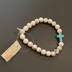 Brand New Never Worn In Perfect Condition. Stretchy Bracelet With Beads. Comes With Travel Pouch. Adjustable White Rosary Bracelet, White Rosary Bracelet With Colorful Beads As Gift, White Rosary Bracelet With Colorful Beads, Adjustable Hand-strung White Rosary Bracelet, White Colorful Beaded Rosary Bracelet, Spiritual White Beaded Bracelets With Colorful Beads, White Spiritual Crystal Bracelet With Colorful Beads, Spiritual White Crystal Bracelet With Colorful Beads, Adjustable White Beaded Bracelets With Gemstones