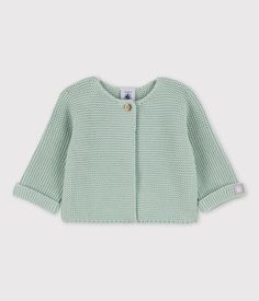 a green knitted cardigan with buttons on the chest and sleeves, sitting against a white background