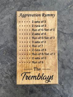 a wooden sign that says,'the tremblays'and features instructions for running