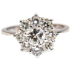 1.40ct. Natural round diamonds cluster ring. Rounds & Full cut Brilliants H-color Vs-2 Si-1 clarity. Center: 4.6mm 14Kt White gold. 2.8 Grams Deck of ring: 11.2mm Depth: 7mm size 5.25 Resizing Service is available. $4,500 appraisal will accompany Gia Certified Dazzling Cluster Diamond Ring, Gia Certified Diamond Cluster Halo Ring, Moissanite Cluster Ring In Diamond White, Cluster Ring With Brilliant Cut For Promise, Cluster Diamond Ring With Halo Setting In Platinum, Brilliant Cut Cluster Promise Ring, Moissanite Cluster Ring For Anniversary, Platinum Diamond Ring With Halo Setting In Cluster Shape, Platinum Cluster Diamond Ring With Halo Setting