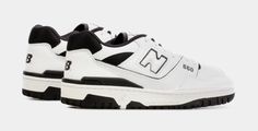 This offering of the New Balance 550 features a White leather base with Black contrasting accents on the mesh collars along with throughout the shoe. A White smooth leather “N” logo on the sides atop a Black/White rubber outsole completes the design. N Logo, Shoe Palace, Balance 550, Lifestyle Shoes, Mens Lifestyle, Shoes White, White Beige, Shoe Care, Smooth Leather