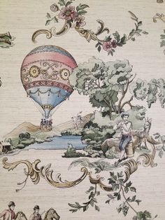 a wall paper with an image of a hot air balloon flying over trees and people