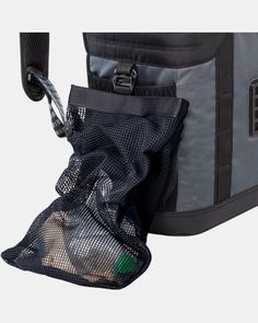 an image of a bag with mesh bags attached to the front and back sides that are open