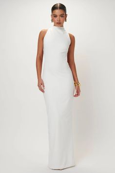 The Ambre Gown in White looks simple enough from the front but the real drama is at the back - it's open and cut low for added elegance. It's made from stretch crepe that skims your frame and falls to a maxi hem. Stretch crepe, jersey lining Zip fastening at back Model wears XSMALL Dry clean or cold wash Made in Austra White Simple Long Dress, White Crepe Dress, White Formal Gowns, Cocktail Outfits, Simple Long Dress, Black Tie Attire, Elegant White Dress, Clothes Wishlist, Homecoming Outfits