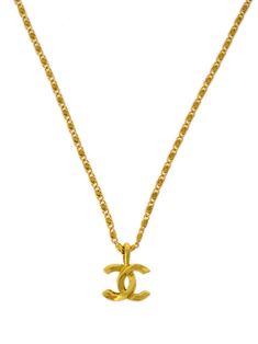 circa 1982 gold plated signature interlocking CC logo logo pendant spring-ring fastening Condition: GOOD. This previously owned and used item is in good condition with minimal signs of use. This may include fading of material or plating and scratches. Purchasing this item continues its narrative and reduces the environmental impact by avoiding the use of new resources needed to make the product from scratch, such as water, materials and electricity, and avoiding additional manufacturing impact. Learn more about what makes a product Conscious on our Conscious Criteria page Vintage Gold Necklace With Gold-tone Logo Plaque, Classic Gold-plated Jewelry With Logo Charm, Classic Gold Jewelry With Logo, Classic Gold Plated Jewelry With Logo Charm, Classic Gold-tone Logo Plaque Necklace, Classic Yellow Gold Jewelry With Logo, Classic Yellow Gold Necklace With Logo Charm, Classic Gold Necklace With Logo Charm, Yellow Gold Jewelry With Logo For Gift