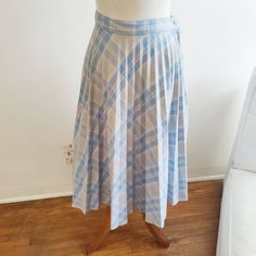 Plaid a-line skirt with skinny pleats. Baby blue, tan and white. The colors are beautiful together.  by Sears. size tag is missing no stretch 70s vintage waist - 13" across hips - 21.5" across length - 28" Grunge Skirt Y2k Plaid Blue, Vintage Blue Lined Skirt, Vintage Plaid Pleated Skirt, Vintage Plaid Full Skirt, Vintage Plaid Cotton Skirt, Vintage Plaid, Plaid Skirts, Baby Blue, A Line Skirts