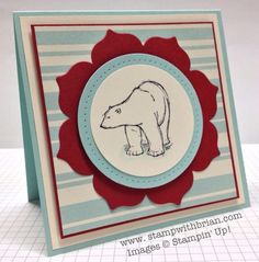 a close up of a card with a polar bear on the front and bottom corner