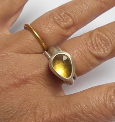 Citrine ring - Beautiful Citrine ring , The Citrine is inlaid in sterling silver . The Citrine gemstone size is - 15/11mm. The sterling silver ring band is 4mm. The ring size 10US/62U. Two sterling silver band rings 1.5mm. The Ring will be packed in a Beautiful gift box. Free Shipping! Your ring will be shipped to you via registered air mail with tracking number. Please contact me with any questions or requests. Silver Teardrop Ring With Polished Finish, Teardrop Promise Ring With Polished Finish, Silver Sterling Teardrop Rings, Silver Sterling Silver Teardrop Rings, Silver Teardrop Sterling Silver Rings, Silver Citrine Birthstone Ring, Unique Polished Promise Ring, Unique Promise Ring With Polished Finish, Modern Sterling Silver Jewelry With Stone Setting