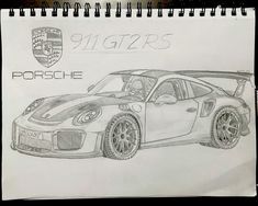 a drawing of a porsche gtr car on a notepad with the name 911rs