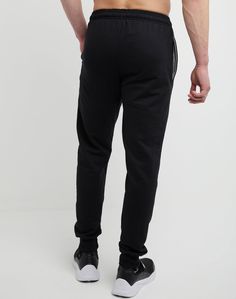 COMMIT TO COMFORT Incredibly soft, this sporty design streamlines your look with all your favorite tees and sweatshirts. Versatile and comfortable, these men’s joggers keep you comfortable at the gym or out and about. With a soft cotton-blend fabric that's brushed on the interior, these pants have quality covered. These men's joggers have adjustable drawcords and an elastic waistband to lend to that perfect fit no matter what. Two side pockets hold your tech and essentials while you’re on the go Comfy Sweatpants, Sporty Design, C Logo, Pants For Men, Ankle Cuffs, Mens Joggers, Fleece Joggers, Mens Activewear, At The Gym