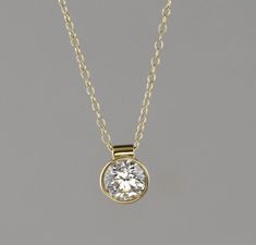 "18 kt yellow gold pendant. Set with 0.84 carat G-VS2 diamond. The Diamond can be upgraded in size or quality or lesser size and quality. The pendant comes with an 18 kt 1.2 mm 16\" cable chain. (optional ) Diamond is certified." Luxury 22k Gold Round Pendant Jewelry, Diamond Pendants Designs, Diamond Necklace Designs, Sterling Silver Rings Set, Peridot Earrings, Silver Ring Set, Personalized Pendant, Yellow Gold Pendants, Domed Ring