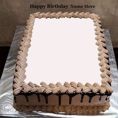 a sheet cake with white frosting and chocolate icing