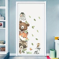 the door is decorated with animals and leaves