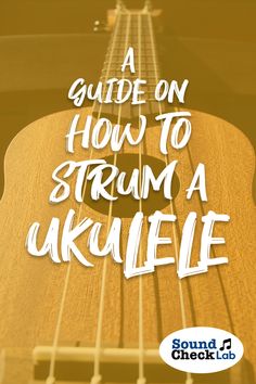 an ukulele guitar with the words guide on how to strum a ukulele