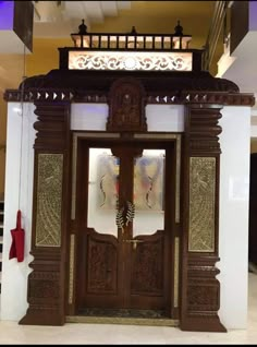 an ornate wooden door with intricate carvings on it