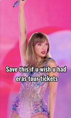 taylor swift performing on stage with the words save this if i wish u had eras tour tickets