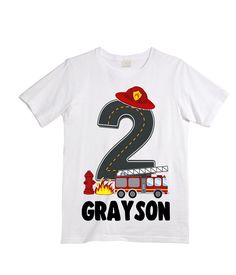 a white t - shirt with the number two on it and a firetruck