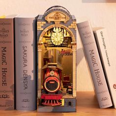 there is a clock in the middle of some books