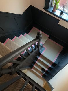 Pink/grey/white tape binding on a beige wool stair runner. Navy painted stairs and navy panelled walls with a shaped half landing area Taped Stair Runner, Edwardian Stairs, Pink Stair Runner, Painted Stair Runner, Beige Stair Runner, Pink Staircase, Pink Stairs, Victorian Stairs, Cottage Hallway