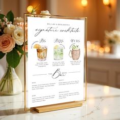 a table with a menu on it and flowers in vases behind the sign that says signature entree