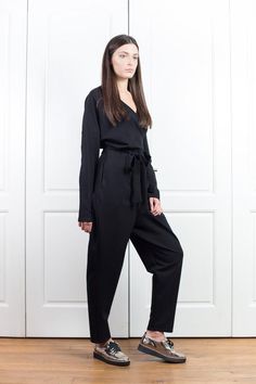 Jumpsuit Women, Harem Jumpsuit, Black Jumpsuit🌟 Black loose jumpsuit with side pockets and long belt🌟 Made from two cotton fabric🌟 Available in black, white, blue, beige, red, light gray, dark gray, camouflage/green, camouflage/gray🌟 Sizes from XS to 5XL. Plus sizes at no extra cost! 🌟 The model is wearing size S. Find more beautiful jumpsuits for women here: https://www.etsy.com/shop/Fraktura?ref=seller-platform-mcnav&section_id=24137988📦 EVERY order is shipped express via UPS courier so Black Long Sleeve Jumpsuits For Work, Black Long Sleeve Jumpsuits And Rompers For Work, Formal Black Long Sleeve Bodysuit, Black Long Sleeve Formal Bodysuit, Black Long Sleeve Bodysuit For Formal Occasions, Women Romper, Jumpsuit Plus Size, Elegant Jumpsuit, Womens Black Jumpsuit