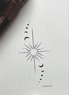 an ink drawing of the sun and moon