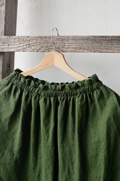 Below the knee skirt is made from 100% soft and washed linen. This Petticoat is perfect for wearing under dress or other skirt or can be worn alone. Match it with our tunics! Details: - Composition: 100% Oeko-Tex certified linen - Colour: forest green - Elastic waist - Pockets - Size: One size/fits all - Medium weight linen - Linen care: machine wash gentle; tumble dry low, ironing optional - The price is for one skirt, other pictured items are not included Solid Linen Summer Skirt, Solid Linen Skirt For Summer, Relaxed Peasant Skirt For Summer, Summer Cotton Peasant Skirt, Solid Long Linen Skirt, Linen Mini Skirt For Summer, Summer Peasant Cotton Skirt, Peasant Style Cotton Skirt For Summer, Casual Linen Mini Skirt For Spring