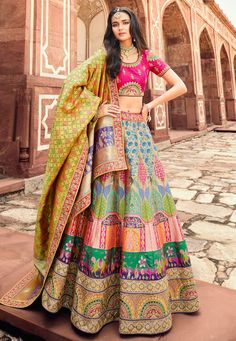 Banarasi silk a line lehenga choli in Beige colour 10198  Desc:  Style : A Line Lehenga Choli Color : Beige   Magenta Fabric : Banarasi Silk Work : Embroidery Wash Care : Dry clean Sleeve Style : Half Sleeve Long Sleeves : Done only in Custom Stitch Sleeves Lining : Done only in Custom Stitch Bust Size : 32 to 42 Inches Occasion : Wedding   Sangeet   Engagement   Reception   Ceremonial   Navratri   Baby Shower. With Express Free Shipping and Custom Stitching, Buy Indian Party wedding wear bridal Multicolor Lehenga, Anarkali Lehenga Gowns, Engagement Lehenga, Pengantin India, Anarkali Lehenga, Reception Lehenga, Designer Bridal Lehenga, Lehenga Choli Online, Neck Deep