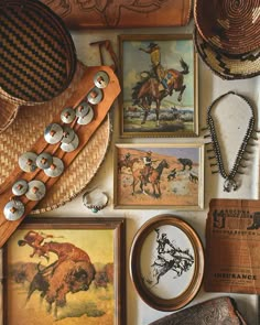 an assortment of cowboy related items are displayed on a wall with hats and other things