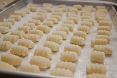 some kind of food that is in a pan on the table and ready to be cooked