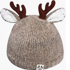 a knitted reindeer hat with antlers on it