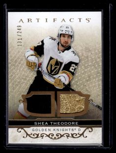 a hockey card with the name of an official player in gold foil on it's back