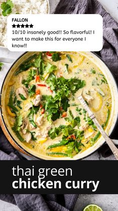 thai chicken curry in a pot with rice and cilantro on the side, next to a lime wedge