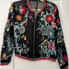 A Showstopper! Mesh Jacket With The Most Beautiful And Intrigue Design. I’m Not Sure If These Are Embroidered Or Applied, But They Are Vibrant And Beautiful. I Purchased This At A High End Boutique Store In Franklin, Tn And Never Wore It. Pit To Pit - Approx 21” Length Approx 23” Sleeve Length Approx 22” I Paid $120. Tags: Garden, Floral, Boho, Nashville, Bachelorette, Butterfly, Mesh, Unique Clothing, Unique Jacket Fall Outerwear With Multicolor Embroidery And Floral Print, Fall Floral Print Outerwear With Multicolor Embroidery, Fall Multicolor Embroidered Floral Outerwear, Fall Floral Print Multicolor Embroidered Outerwear, Multicolor Floral Print Long Sleeve Outerwear, Multicolor Embroidered Floral Print Long Sleeve Outerwear, Spring Black Outerwear With Floral Embroidery, Black Long Sleeve Outerwear With Floral Embroidery, Multicolor Floral Embroidered Spring Outerwear