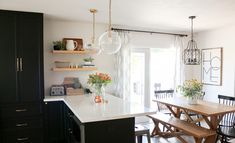 the kitchen is clean and ready to be used for dinner or other entertaining purposes in someone's home