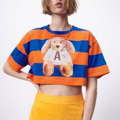 Awww We’ll Always Love A Teddy Bear.. Love Bright Colors Playful Orange Crew Neck Top, Playful Orange Summer Tops, Playful Orange Tops For Summer, Cute Orange Cotton T-shirt, Playful Orange Graphic Print Tops, Zara Multicolor Cotton Tops, Playful Orange Summer T-shirt, Zara Orange Casual Top, Casual Orange Zara Top