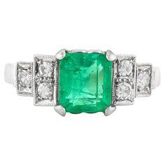 the ring is finely crafted in platinum with center stone emerald weighing approximately total of 1.20 carat and diamonds weighing approximately total of 0.30 carat. Circa 1930. Emerald Cut Wedding Band, Wedding Band With Diamonds, Emerald Band Ring, Platinum Diamond Wedding Band, Band With Diamonds, Emerald Wedding Band, Emerald Band, Platinum Wedding Band, Emerald Wedding