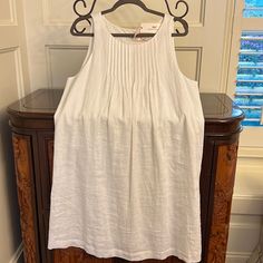 Beautiful Nwt White Linen Dress. Perfect For Spring And Summer! Side Zipper Opening Under Left Arm. White Pleated Dress For Daywear, White Summer Dress With Pintucks, White Sleeveless Pleated Dress With Pleated Bodice, Summer White Dress With Pintucks, White Sleeveless Pleated Dress, Casual White Dress With Pleated Hem, White Casual Dress With Pleated Waist, Sleeveless Summer Dresses With Pintucks, White Pleated Dress For Spring Daywear