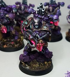 the warhammers are painted purple and black