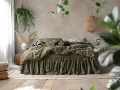 a bed in a room with plants on the wall