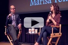 two people sitting in chairs talking to each other at a ted - up with the words,