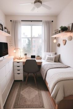 a bedroom with a bed, desk and window