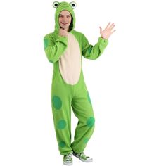 a man in a green frog costume standing with his hands on his chin and smiling