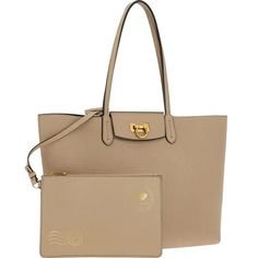 Designed in an everyday carryall silhouette, FERRAGAMO's Travel tote is crafted of grained leather in Italy. This piece is styled with a letter-inspired zip pouch and a signature Gancini clip closure. Two handles Clip closure Removable zip pouch 100% leather Lining: Fabric Made in Italy 11.75"W x 10.5"H x 6.5"D 8057553983481 6.24 Classic Shoulder Bag With Grained Texture For Daily Use, Brown Bags With Grained Texture For Daily Use, Classic Grained Texture Shoulder Bag For Everyday Use, Brown Grained Texture Bag For Daily Use, Chic Bags With Grained Texture For Daily Use, Daily Pebbled Leather Bag With Grained Texture, Daily Use Pebbled Leather Bag With Grained Texture, Everyday Satchel Bag With Grained Texture, Chic Travel Bags With Grained Texture