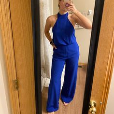 Absolutely Gorgeous Jumpsuit. Beautiful Color, Open Back, Pockets!! Sold Out Online, This Style In Other Colors Selling For $68. Never Worn, New With Tags Sleeveless Blue Pantsuit For Summer, Blue Summer Pantsuit For Party, Blue Pantsuit For Summer Party, Blue Overall Jumpsuit For Night Out, White Wide Leg Jumpsuit, Black Backless Jumpsuits, Camouflage Jumpsuit, 2 Piece Jumpsuit, Olive Green Jumpsuit