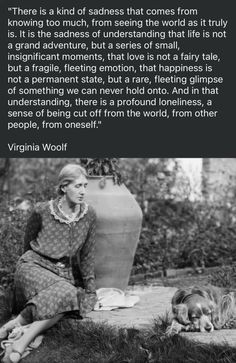 a woman sitting on the ground next to a vase with a poem written in it