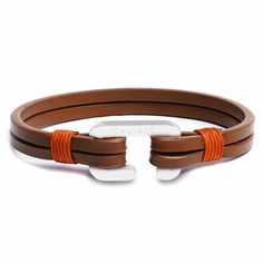 The Egoist Tan Brown is a two-strap leather bracelet with a stainless steel D-Shackle and a hard-wearing orange nylon thread. This minimalistic leather bracelet comes in three standard sizes: Small, Medium, and Large. No matter which size you are in, this stylish accessory will fit at your wrist the way you will even forget about dumping it for the night! Do not hesitate to shop for a Bow-Shackle Black Matte as it will completely change the Egoist Tan Brown bracelet, making it look fresh and lux Brown Leather Bracelet, Brown Bracelet, Gold C, Minimalist Bracelet, Black Matte, Stylish Accessories, Bracelet Sizes, Tan Brown, Bracelet Making