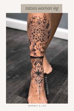 a woman's foot with flowers on it and an intricate tattoo design in the middle